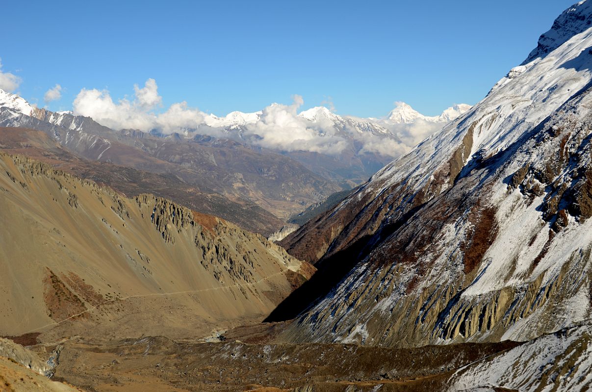 24 Looking Back Towards Manang With Kang Guru, Pisang Peak, Manaslu, and Ngadi Chuli On Trek From Tilicho Base Camp Hotel To Tilicho Tal Lake 